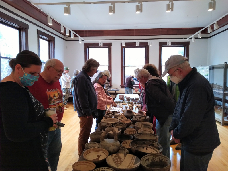 Viewing the newly-arrived artifacts at the WNMU Museum