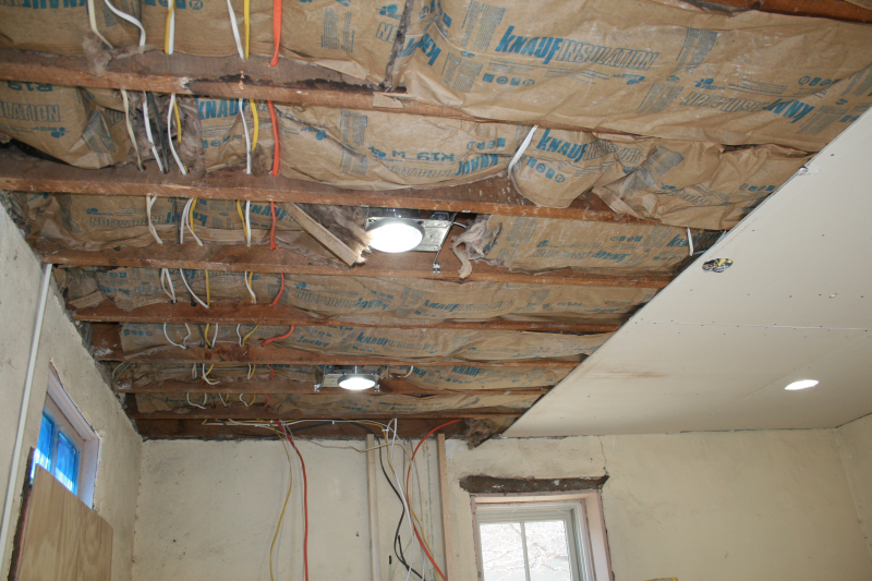 insulation installed between ceiling rafters